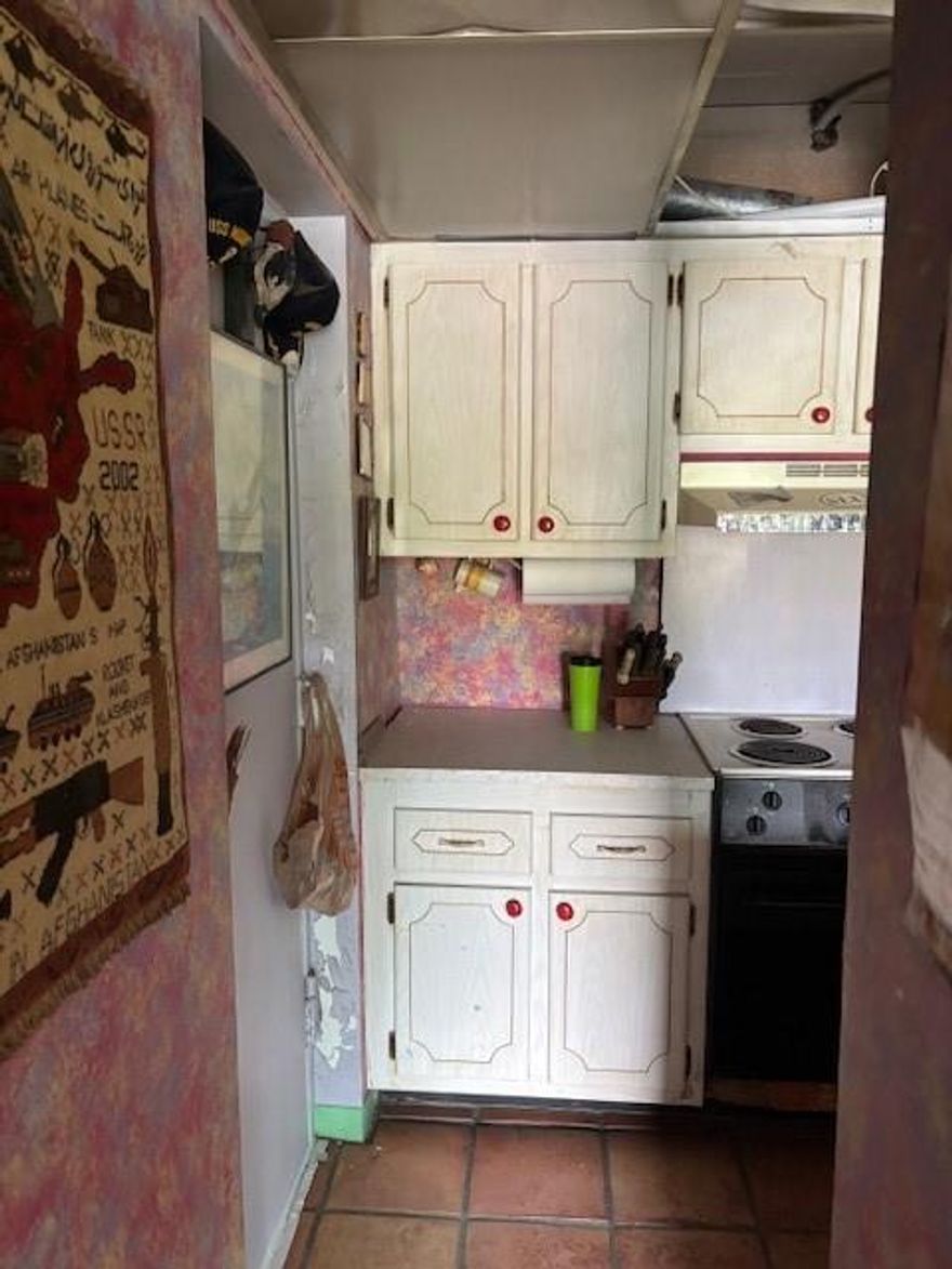 DISCLOSURE - Buyer is paying $95K for the future option to pay 95% of the appraised value to HUD in the future. Not now as there is No pending action and HUD paying property taxes currently as well. This is a HUD HECM Law to protect homeowner on title..  - This unit needs everything and sold AS IS - but does have three bedrooms which is rare. Corner Unit with many amenities including fitness center, pickelball, pool, tennis courts, elevators and no fixed bridges for boaters. And a security gate.   This unit was converted to a 3/2 many years ago but still remains 1025 square feet