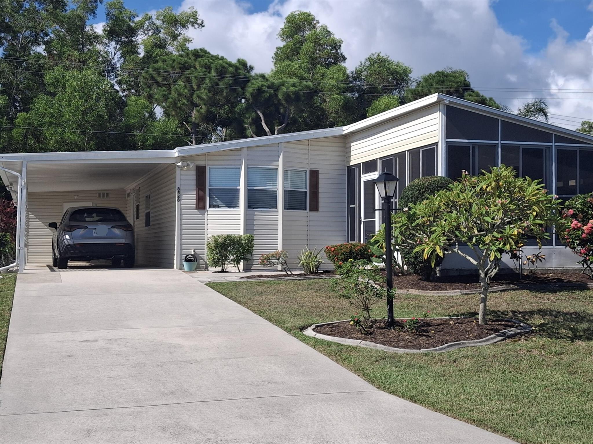 Land Owned with a private backyard. New Roof 2025. New PVC plumbing 2025. Many new anchors and new vapor barrier installed 2025. Foundation redone in 2022. New AC and new double pane low-E windows 2019. Remodeled primary bath in 2019. Whole home surge protector, large shed and lots of storage throughout the home. Open concept living, dining, kitchen for easy entertaining. Avoid expensive repairs with all the updates that have already been completed. Just add your decorative touches to make it your own. Must see! HOA includes cable, internet, trash and access to all the amenities. Savanna Club activities include an 18-hole golf course, 3 pools, 3 exercise rooms, an on-site restaurant, a theater, pickleball, billiards, tennis, and numerous other activities to enjoy.