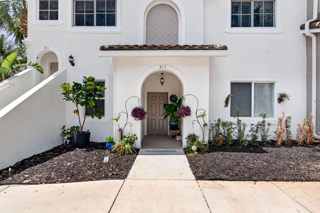 Photo of 311 Bayfront Drive, Boynton Beach, FL 33435 (MLS # B26042317)
