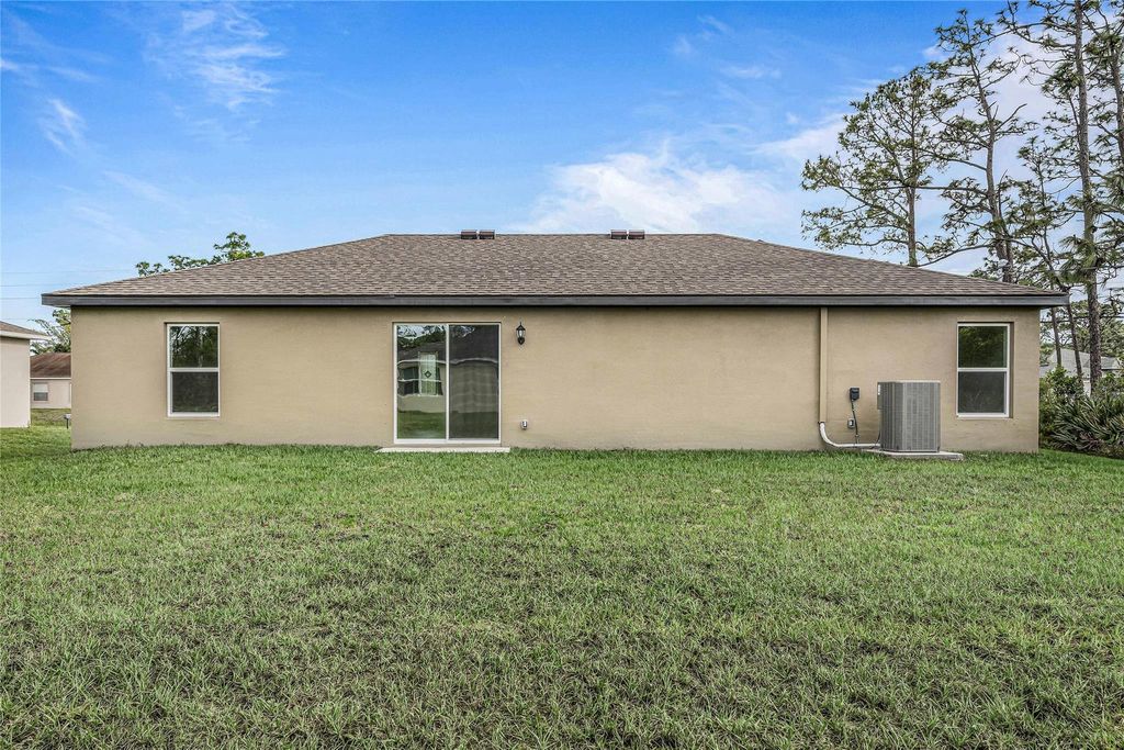 Photo of 2101 SW Medlock Avenue, Port Saint Lucie, FL 34953 (MLS # F10474893)