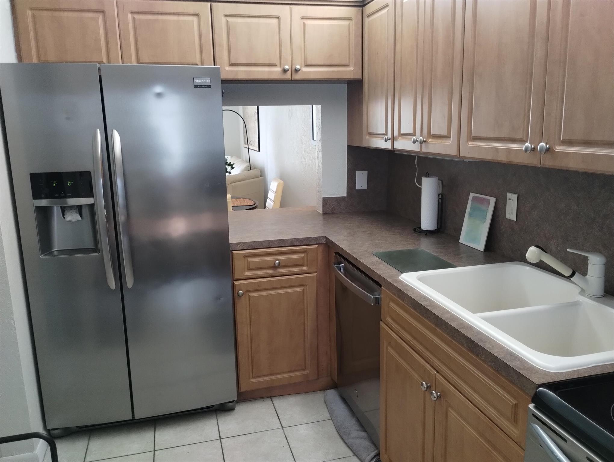 Modern 2-bedroom, 2-bath furnished or unfurnished condo located near the beaches and close to Fort Lauderdale Airport. This peaceful and clean unit is just a 15-minute drive to Deerfield Beach and Pompano Beach. Amenities include a pool, workout room, BBQ area, pool table, shuffleboard, and a one-hole putt-putt course. The condo features a 60-inch TV, a designated office desk area, Wi-Fi, and large bedrooms with ample closet space. Enjoy the patio with a view of the pool. The building includes an elevator and a laundry room for added convenience. You will love this unit; it is the perfect Florida rental. Showings are by appointment only.