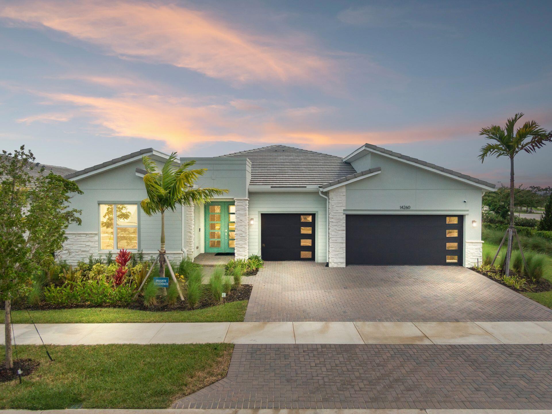 Luxury Living in Seville - A Rare Corner Homesite with Long Lake ViewsImpeccably crafted in 2024, this elegant residence showcases refined finishes, timeless design, and one of Seville's most desirable corner lots. With expansive long lake views as the backdrop, the home offers a perfect blend of sophistication, comfort, and serenity.Inside, soaring ceilings and oversized wood-look tile floors create a bright, airy atmosphere. The open-concept great room is anchored by a striking custom porcelain fireplace and triple sliding glass doors, seamlessly connecting indoor and outdoor living.The gourmet kitchen is both stylish and functional, featuring quartz countertops, sleek cabinetry, double wall ovens, and a gas cooktop--perfect for everyday living or entertaining.