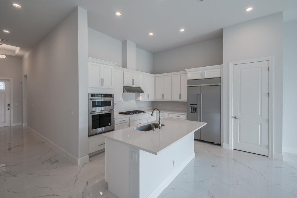 Photo of 12468 Nautilus Circle, Palm Beach Gardens, FL 33412 (MLS # R11124402)
