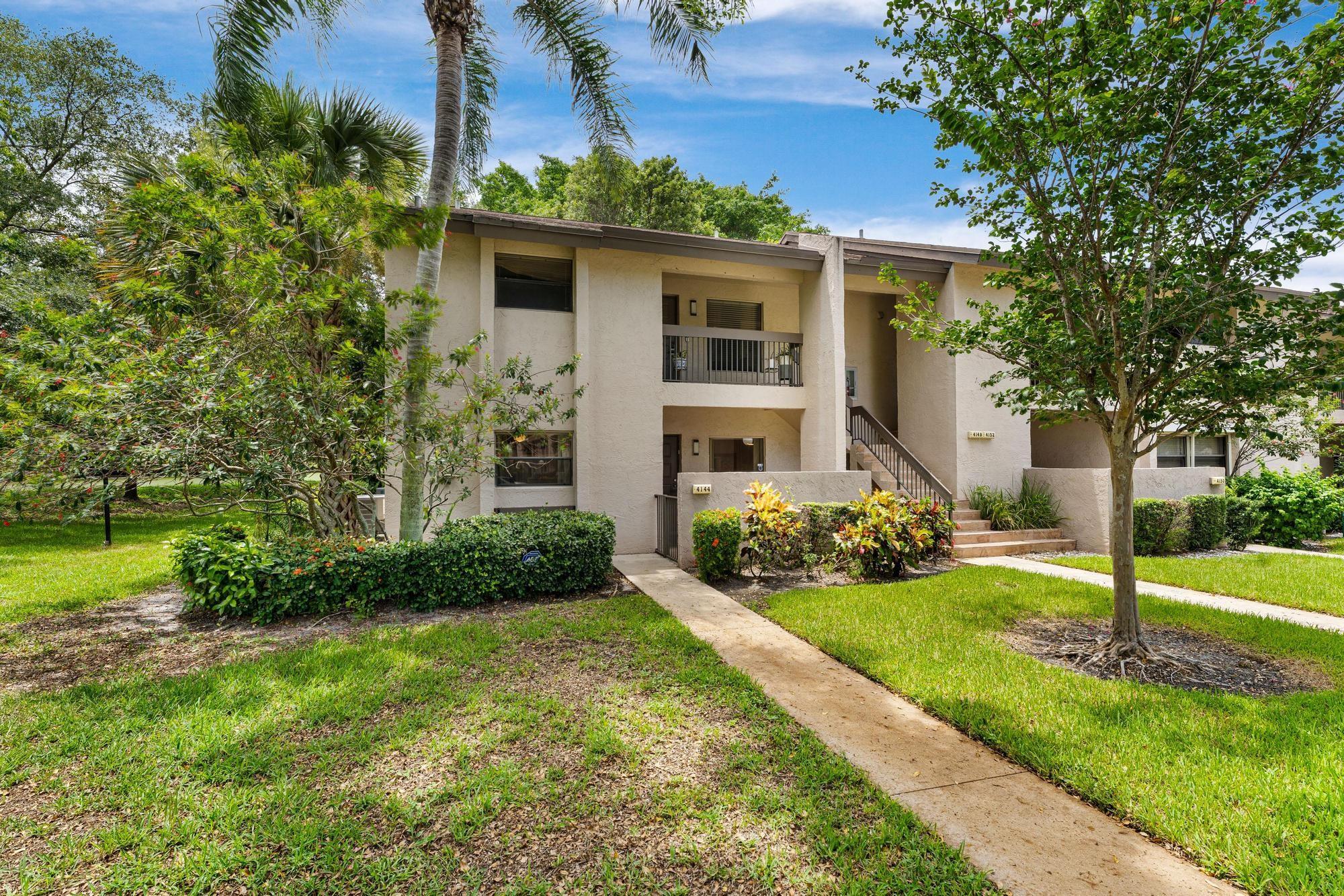 Perfect Location in Pond Apple Place 3*This First Floor Corner Condo on a huge Lot and offers the best privacy in the village. You are greeted by a private gated entrance Patio w/ storage closet*Inside this Newport Model home features a spacious kitchen w/ full size, front loading washer/dryer & New Refrigerator*The Spacious Living and Dining Rooms are carpeted and furniture is negotiable*You can enjoy your Glass enclosed Patio year round while you gaze out at the lush green lawn & foliage*Large Primary Bedroom has 2 windows and sliding glass doors to the enclosed patio*It features a large walk in closet, Updated Vanity and walk in shower*The 2nd bedroom has French Doors & a large window* It is being used as a den/office*The community features amenities for all ages incl. Heated Pools*