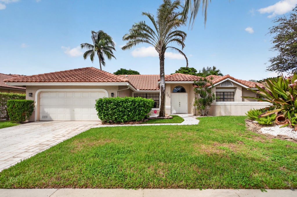 Photo of 311 NW 37TH Way, Deerfield Beach, FL 33442 (MLS # B26087323)