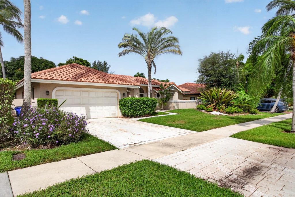 Photo of 311 NW 37TH Way, Deerfield Beach, FL 33442 (MLS # B26087323)