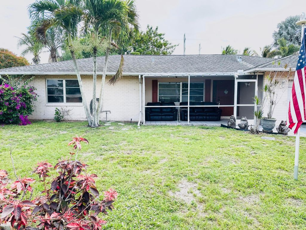Photo of 234 Sandpiper Avenue, Royal Palm Beach, FL 33411 (MLS # B26024521)