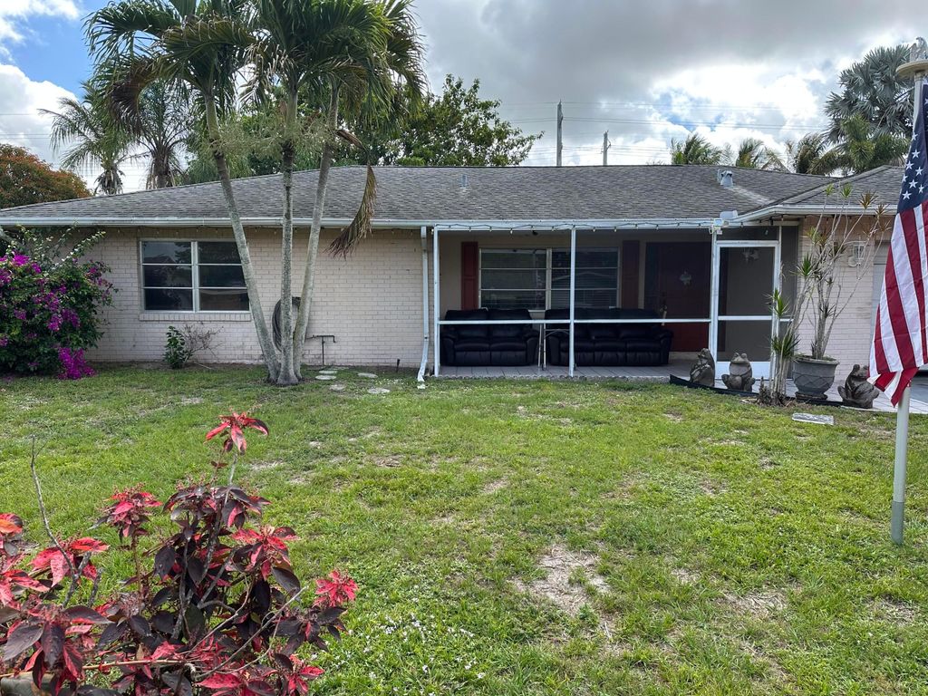 Photo of 234 Sandpiper Avenue, Royal Palm Beach, FL 33411 (MLS # B26024521)
