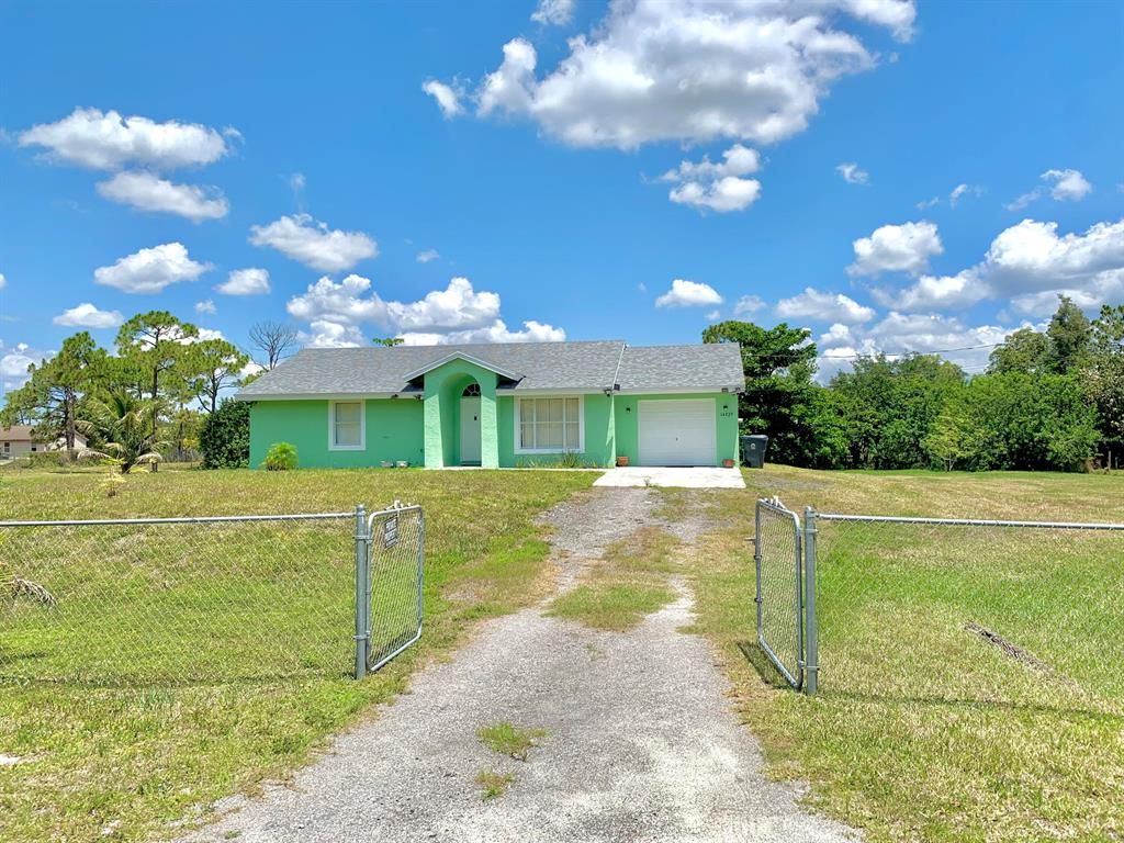 Photo of 14229 82nd Lane N, Loxahatchee, FL 33470 (MLS # R10798394)