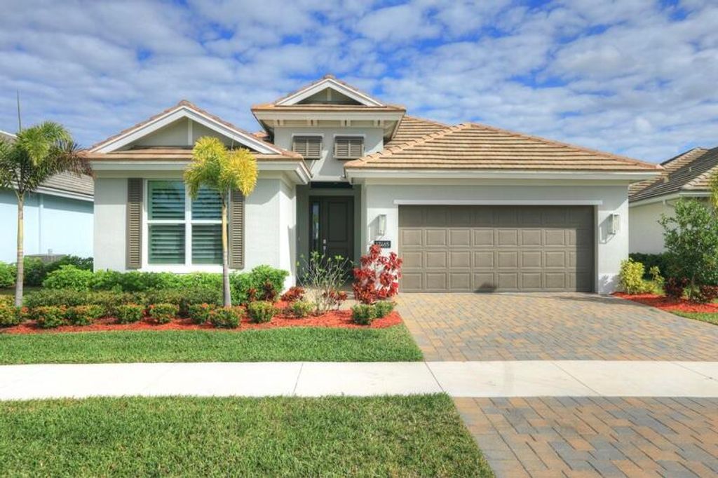 Photo of 12465 Sunrise Lake Terrace, Port Saint Lucie, FL 34987 (MLS # R11156055)