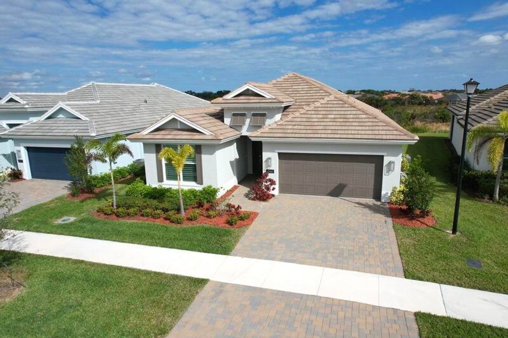 Photo of 12465 Sunrise Lake Terrace, Port Saint Lucie, FL 34987 (MLS # R11156055)