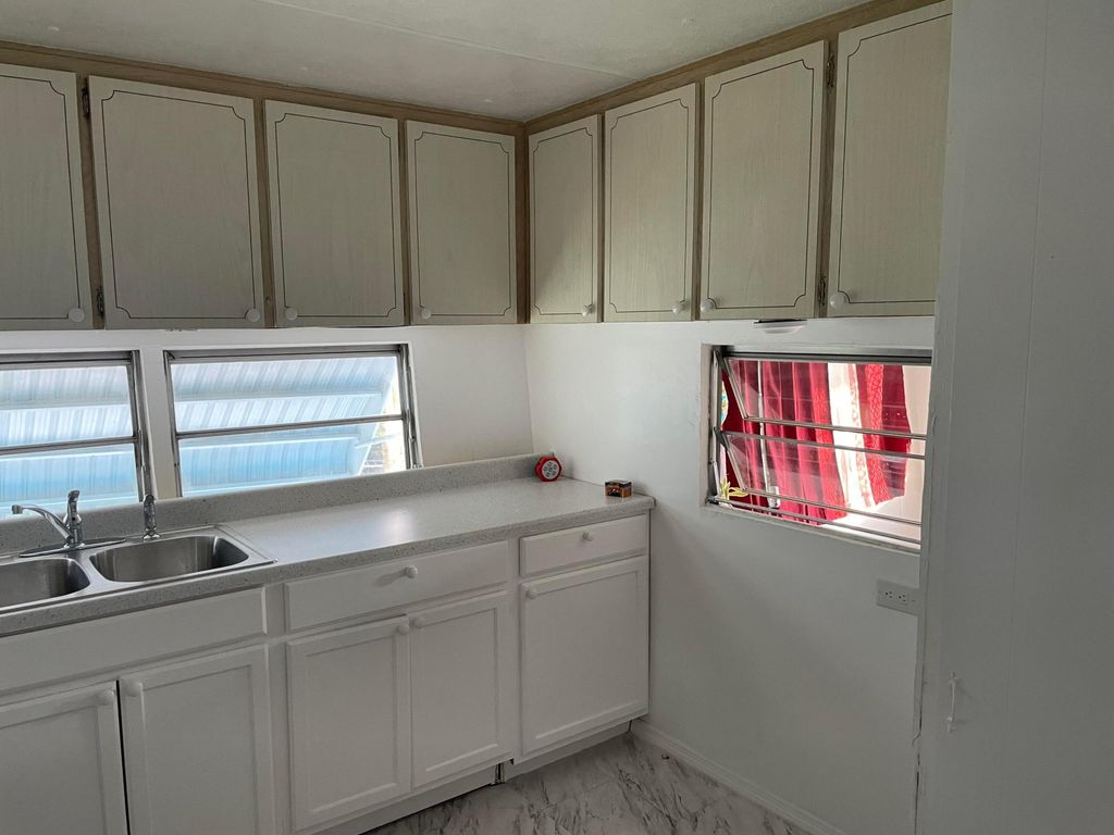 Photo of 2939 Banyan Lane, West Palm Beach, FL 33403 (MLS # B26015100)
