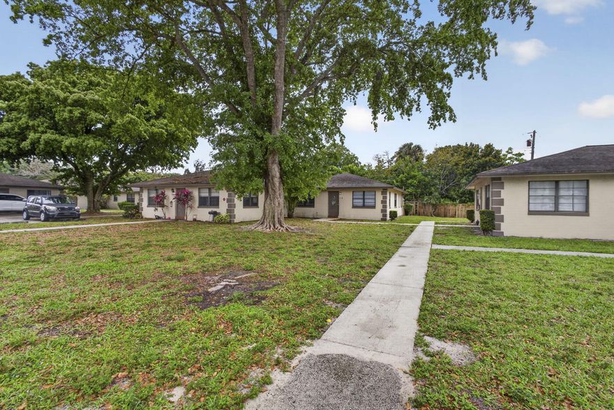 Updated, charming 3 bed 2 bath villa in West Palm Beach & it checks every box. New luxury vinyl floors throughout. Updated kitchen with brand new stove. Freshly painted inside. Your own laundry room. HOA covers the roof & building insurance. Rentals allowed immediately, perfect for investors or first time buyers. Close to shops, restaurants and major highways. Move in ready!