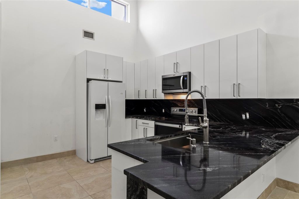 Photo of 10516 Lake Vista Circle, Boca Raton, FL 33498 (MLS # F10496249)