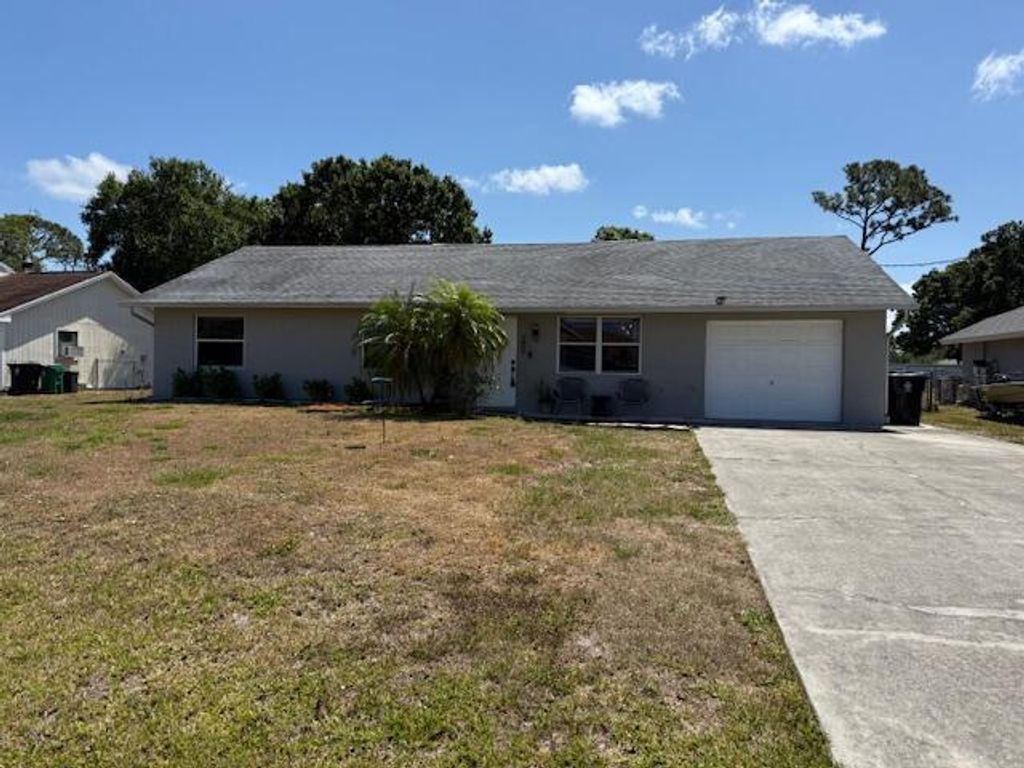 Photo of 1951 SW Agnes Street, Port Saint Lucie, FL 34953 (MLS # R11089393)