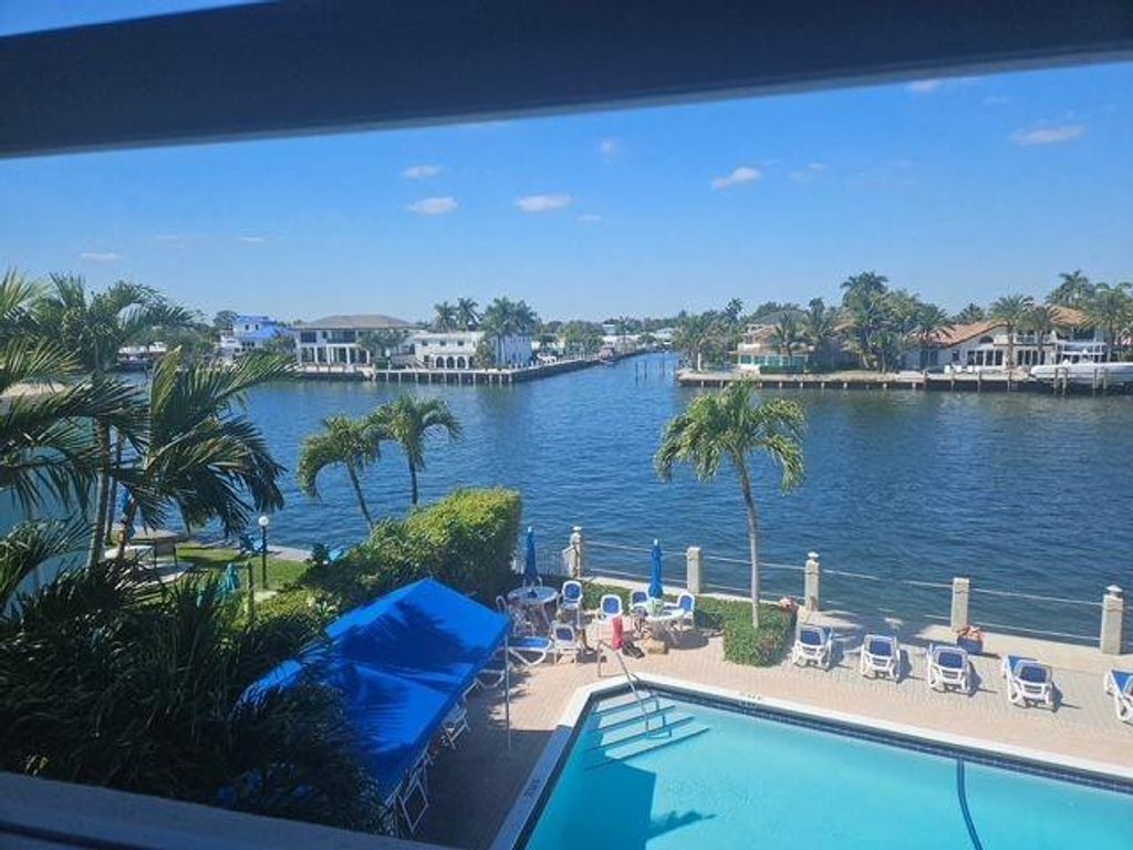 Photo of 615 N Riverside Drive #301, Pompano Beach, FL 33062 (MLS # F10555043)