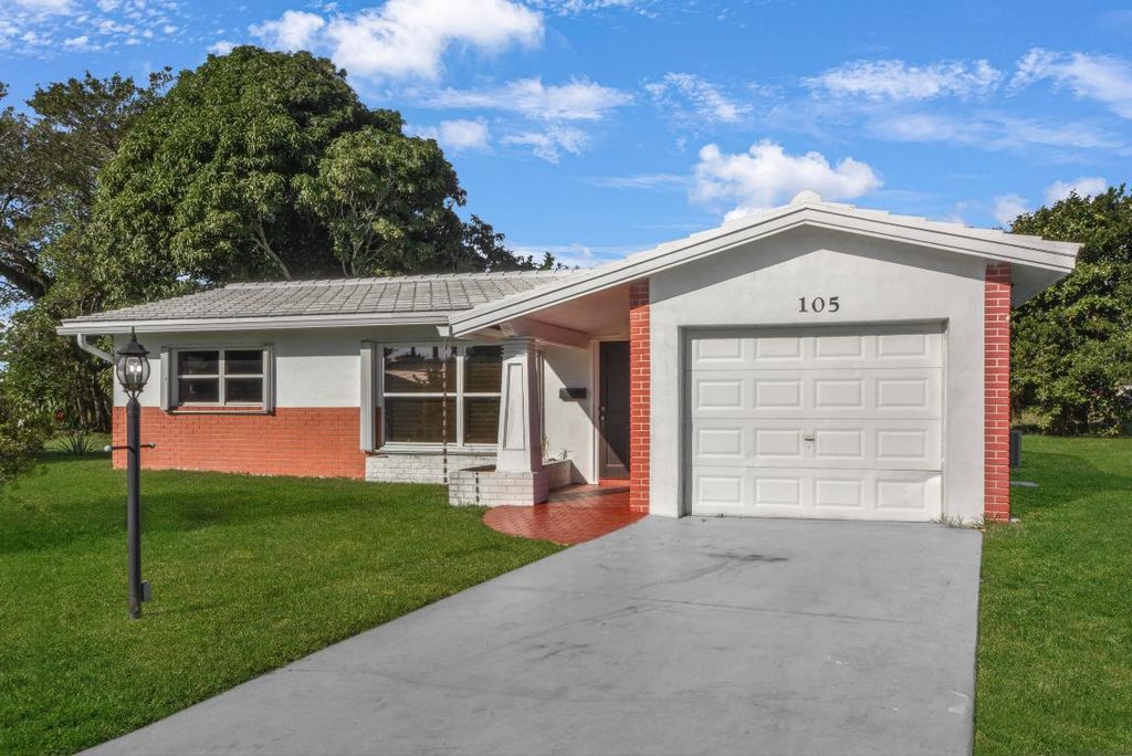 Photo of 105 NW 8th Place, Boynton Beach, FL 33426 (MLS # R11158839)