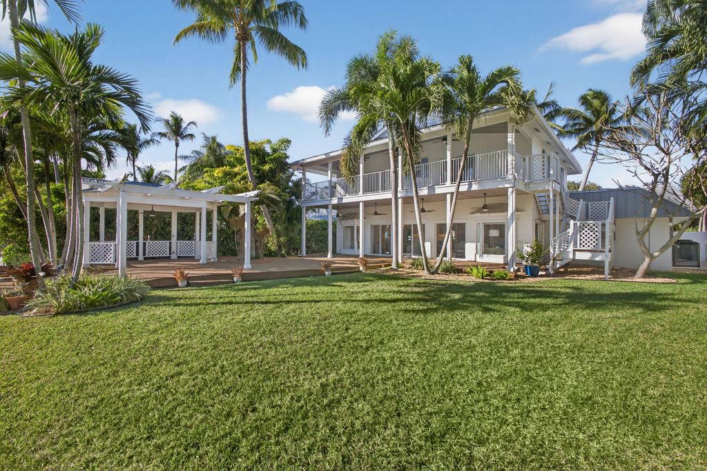 Photo of 104 Eganfuskee Street, Jupiter, FL 33477 (MLS # R11152888)