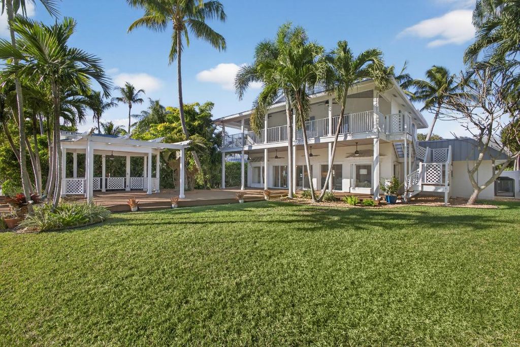 Photo of 104 Eganfuskee Street, Jupiter, FL 33477 (MLS # R11152888)