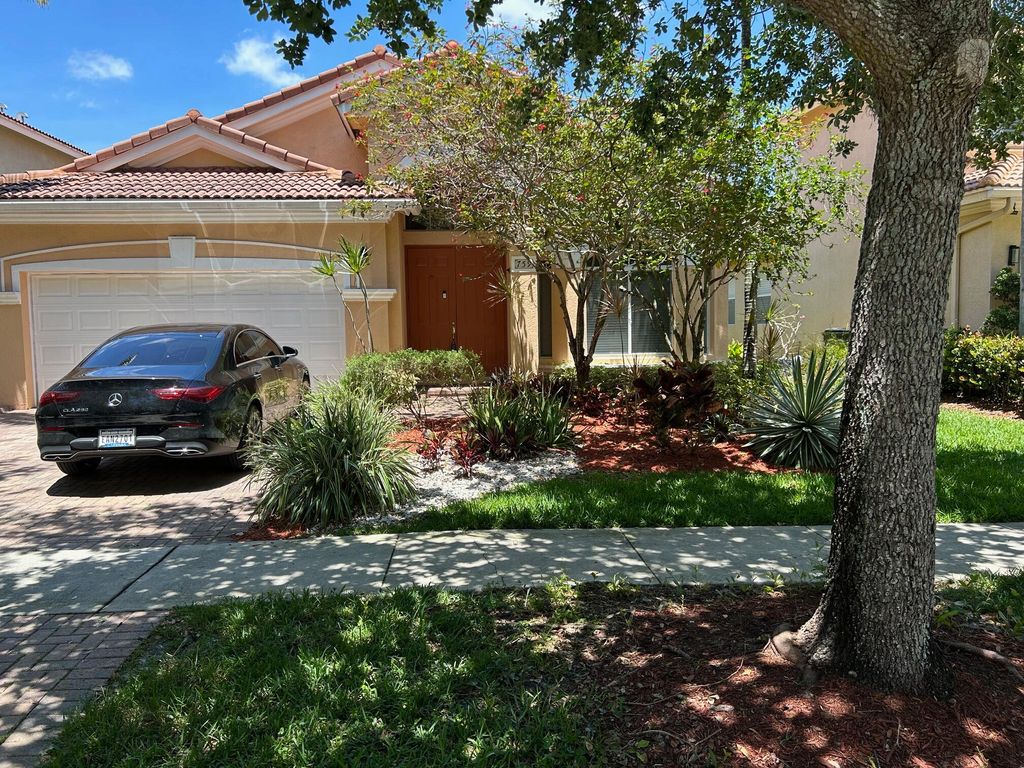 Photo of 759 Gazetta Way, West Palm Beach, FL 33413 (MLS # B26019084)
