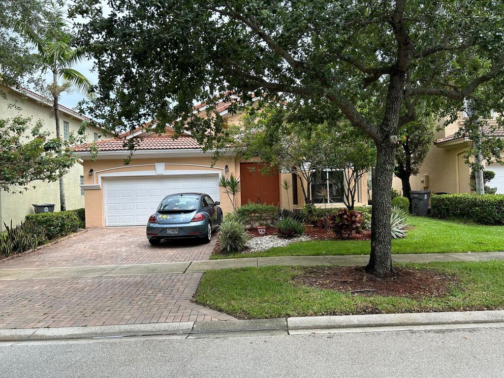 Photo of 759 Gazetta Way, West Palm Beach, FL 33413 (MLS # B26019084)