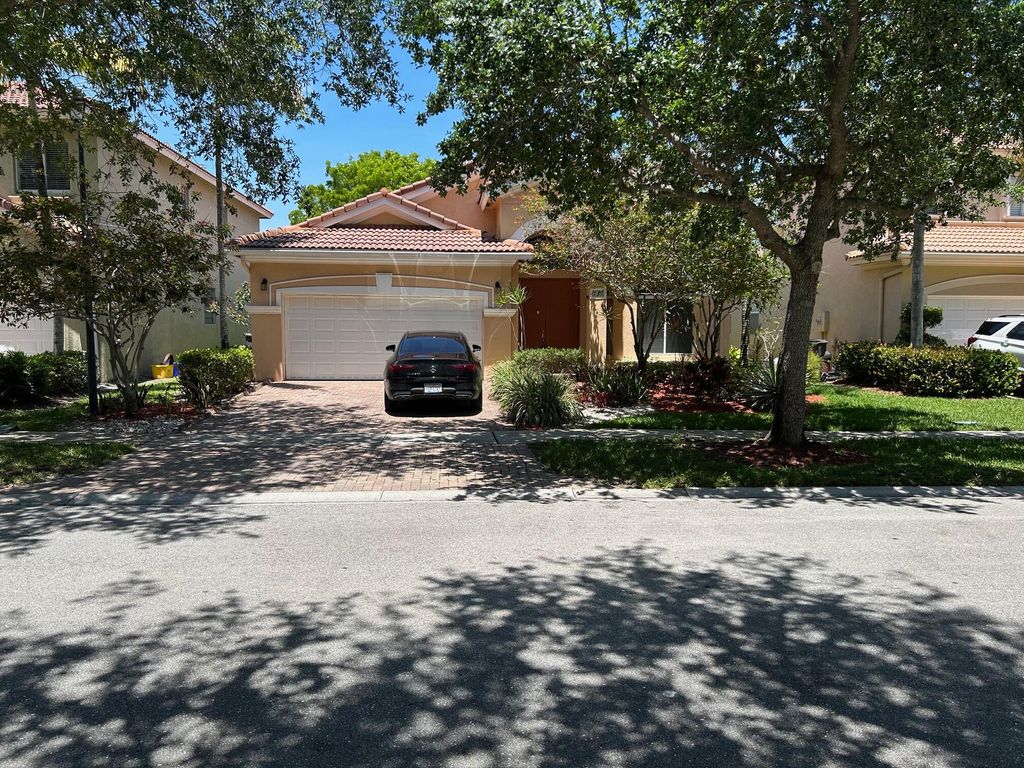 Photo of 759 Gazetta Way, West Palm Beach, FL 33413 (MLS # B26019084)
