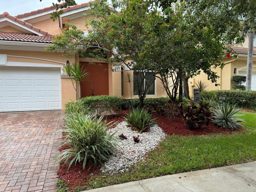 Photo of 759 Gazetta Way, West Palm Beach, FL 33413 (MLS # B26019084)