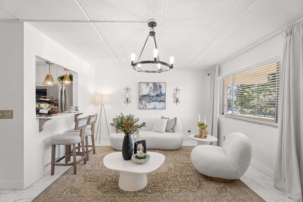 Photo of 200 Village Green Circle E #206, Palm Springs, FL 33461 (MLS # B26044917)