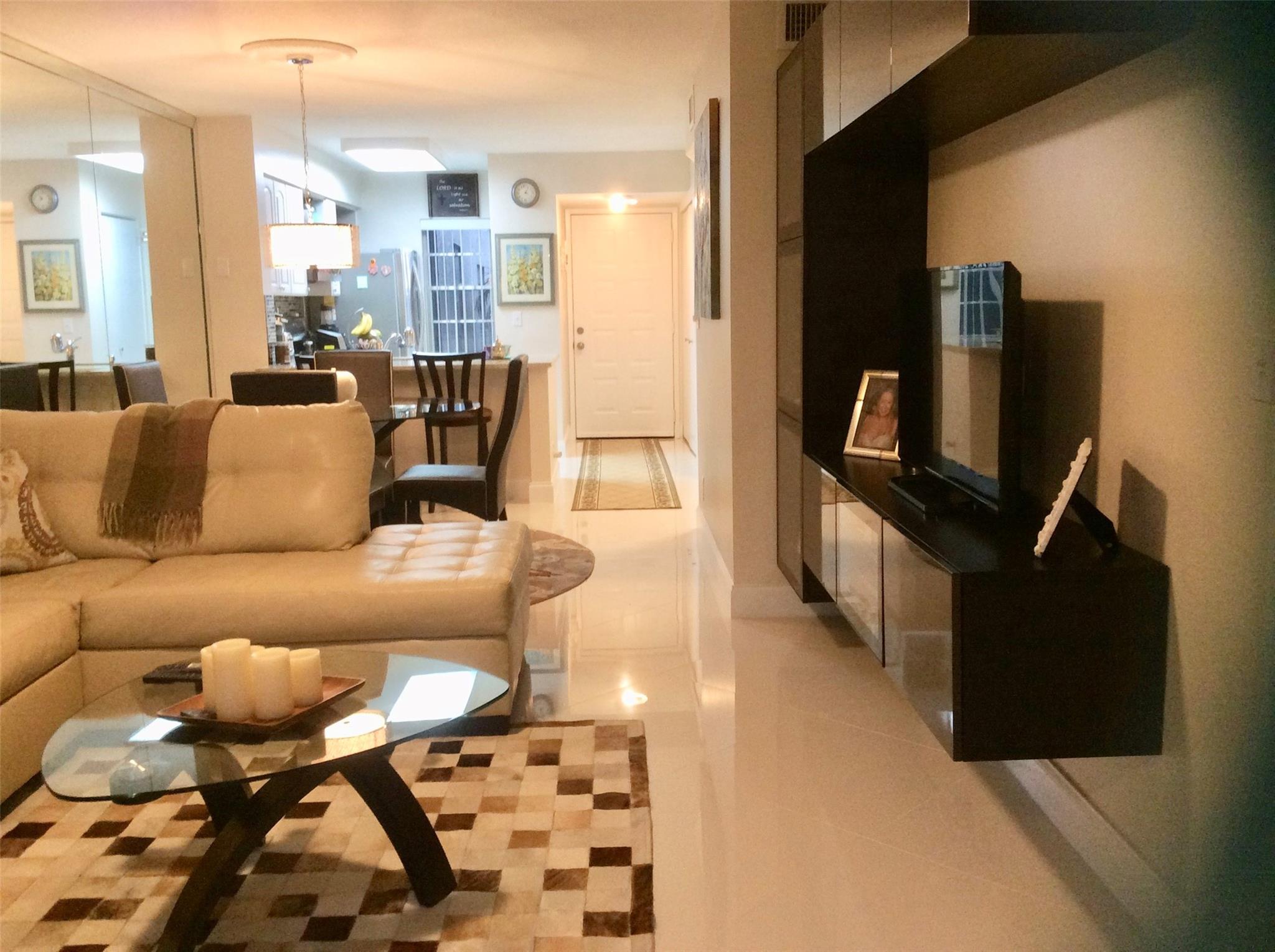 Beautyful all renovated Turnkey furnished 2 Bedroom & 2 baths condo on the first floor. Updated kitchen w/ granite counter top .stainless still appliances. White Porcelain tile floor all over the unit & you have our utility room with Washer & dryer. Just steps to the swimming pool with BBQ area & jacuzzi. Amenities in Cypress Bend are Tennis courts, walking & bike paths, playgrounds for children, gym, basketball & handball court, sauna, library, BBQ. picnic area, security camera. Near Palm Aire & Pompano Beac Golf Club, New Harrah's Casino & Topgolf where you can enjoy crafted fond and drinks. Short access to 1-95 & turnpike Highways & 10 minutes from the Beach, Fishing Pier & top scale restaurantes. Just bring your suitcase and relax.
