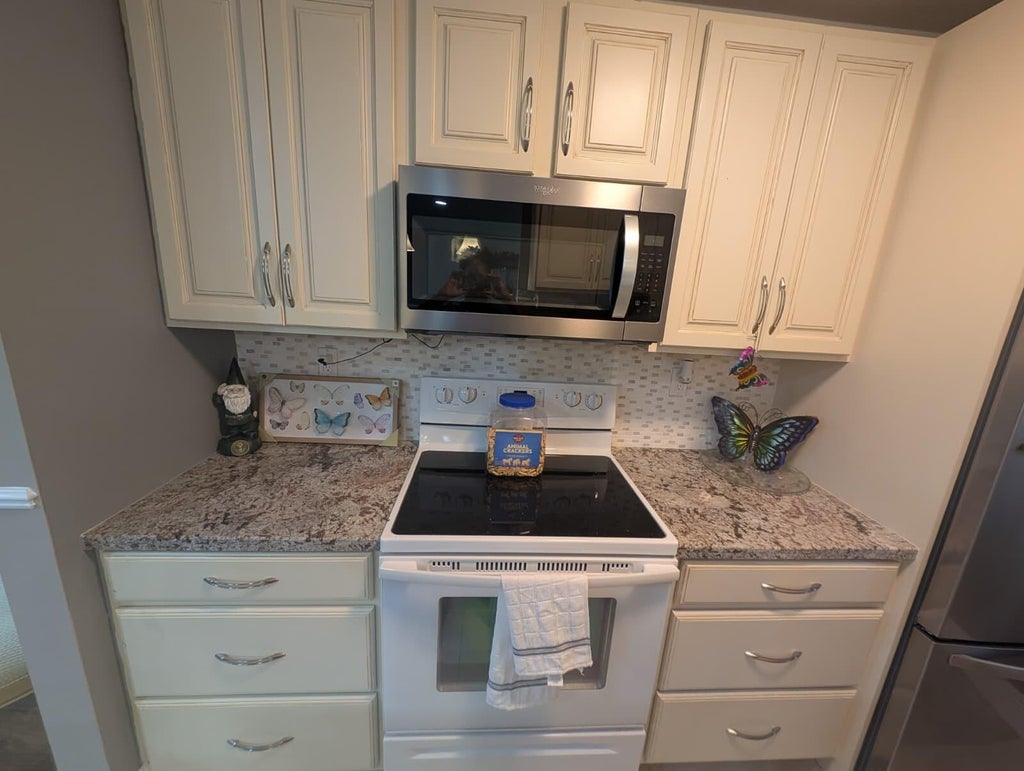 Photo of 855 NORTH Drive #B, Delray Beach, FL 33445 (MLS # B26076617)