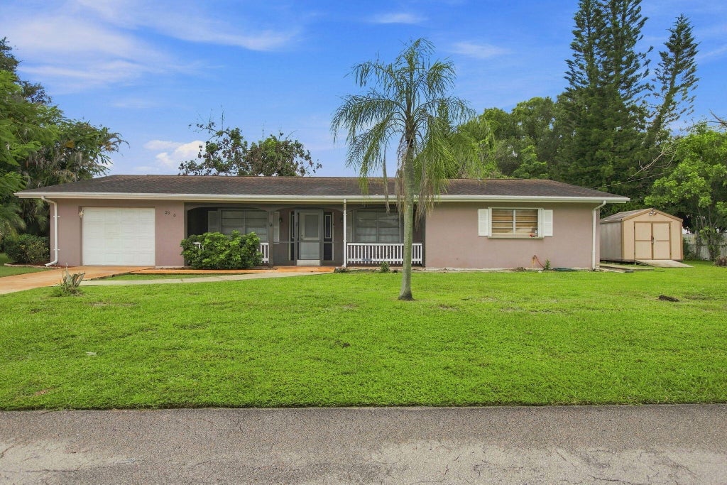 Photo of 2730 Fairway Drive, Fort Pierce, FL 34982 (MLS # B26069911)