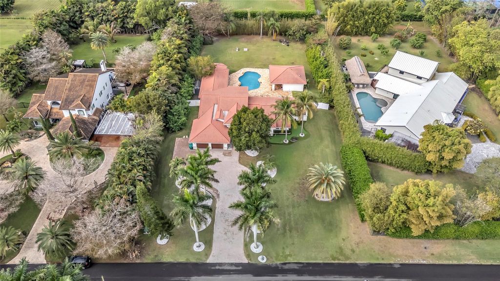Photo of 5963 NW 75th Way, Parkland, FL 33067 (MLS # F10548424)