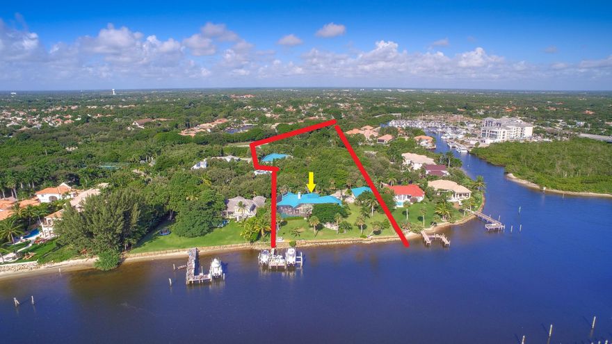 A rare opportunity to create a true estate compound on over 3 acres--a giant parcel on South Florida Intracoastal Waterway --218' on the Intracoastal in the heart of Palm Beach Gardens & nearby Jupiter. This property consists of a 2.63 acre waterfront lot with an existing structure of over 7000 Sq.Ft. and an 8+ car detached garage with an office and a full bath. The dock has 60,000# & 9000# lift & it's a no-wake zone. Hidden among an array of mature oaks and palms, it is true serenity. Adjacent .56 acre lot with an over 4000 Sq.Ft. home must be purchased simultaneously. RX-10469861 Zoned for subdivision possibilities at 5/acre.. World class golf clubs, incl. The Bear's Club & Trump Nat'l. & other 1st class amenities in the most popular location in FL, nearby.