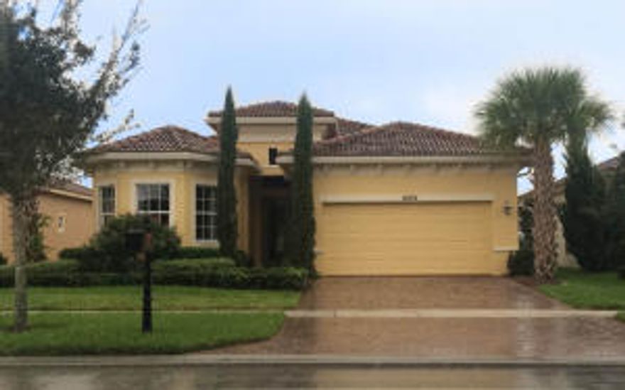 NEW Kolter Home. This Florenza Decorated model has a very open floorplan.  The home has impact glass throughout and spray foam insulation. The foyer leads to the dining room and living room areas as you pass through the first bedroom suite and the den.  The kitchen has granite countertops, stainless steel appliances and pantry and it opens to the large family room area with views of the lake and access to the covered patio and pool area.  The master suite also has a view of the lake as well as his and hers walk in closets, master bath with double vanities, soaker tub, shower enclosure and private commode.   This home is a definitely must see!