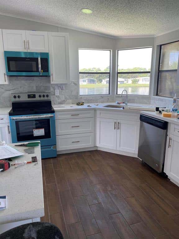 Photo of 3143 Crabwood Lane Ln, Port St Lucie, FL 34952 (MLS # R10746468)