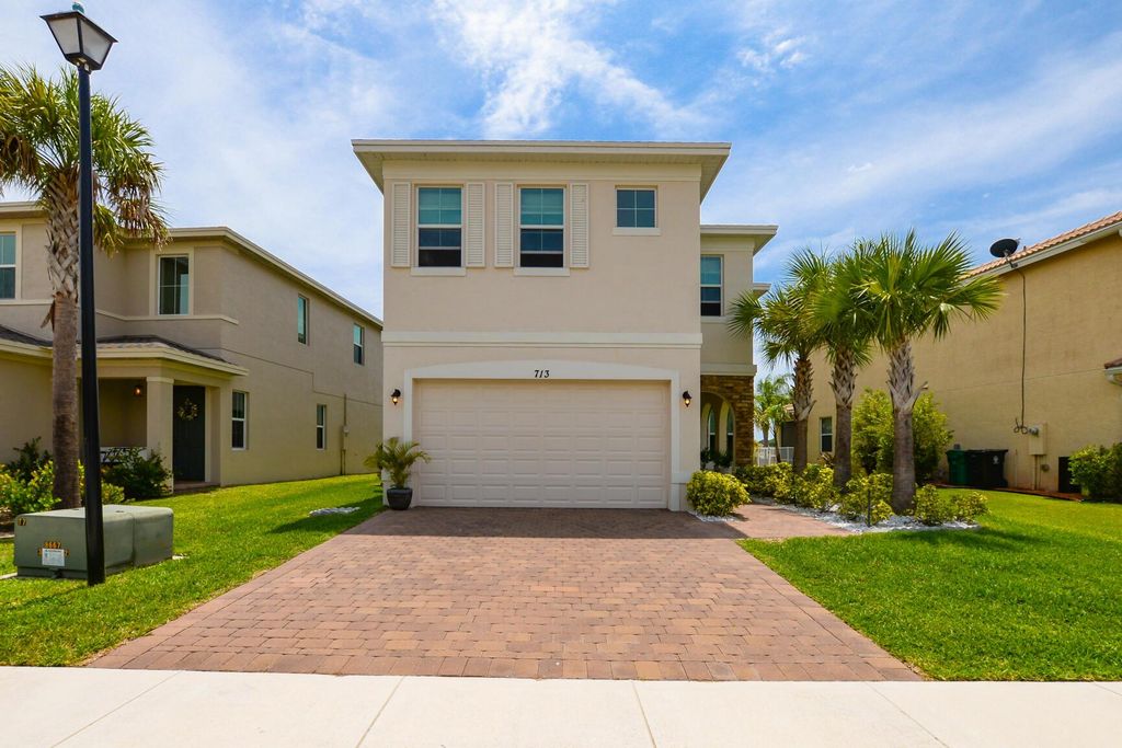 Photo of 713 NW Leonardo Circle, Port St Lucie, FL 34986 (MLS # R10894678)