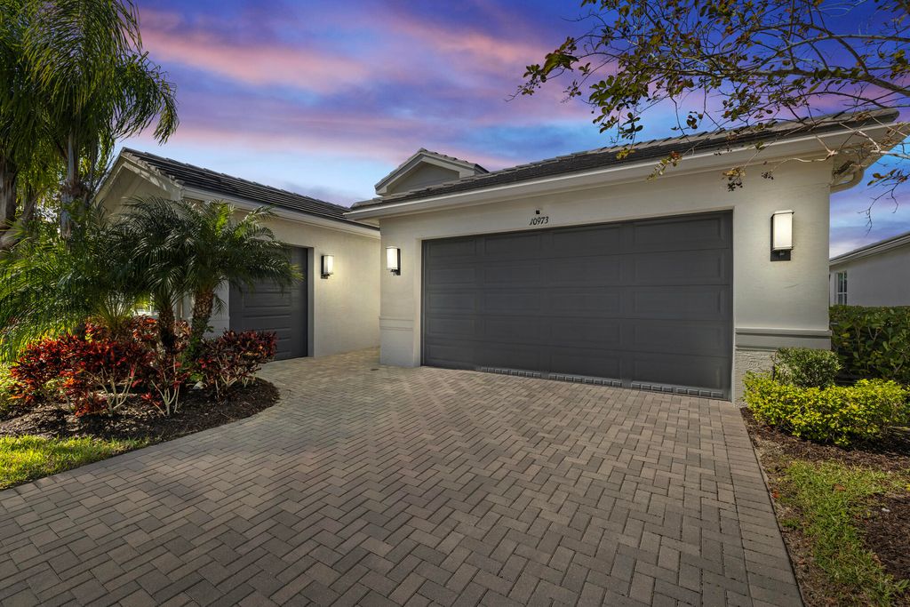 Photo of 10973 SW Sunray Street, Port Saint Lucie, FL 34987 (MLS # R11064180)