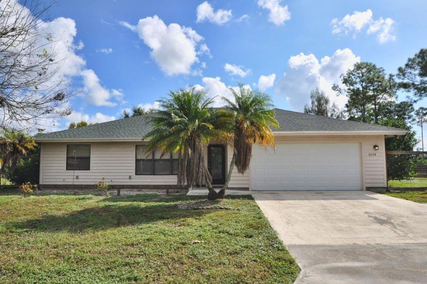 INCREDIBLE OPPORTUNITY - MOVE-IN READY UPDATED HOME. THIS 3BR/2BA HOME WITH 2 CAR GARAGE IS LOCATED ON A 1.22-ACRE LOT THAT IS FULLY FENCED IN. HOME HAS TILE FLOORS THRU OUT, UPDATED KITCHEN, STAINLESS STEEL APPLIANCES, WATER HEATER, A/C,ROOF,PLUMBING, ELECTRICAL ALL UPDATED IN 2013. LOT IS DRY AND CLEARED AND HAS A BEAUTIFUL  KENNEL IN BACKYARD. ONE OF THE FEW LOTS THAT CAN BE HOOKED UP TO CITY WATER