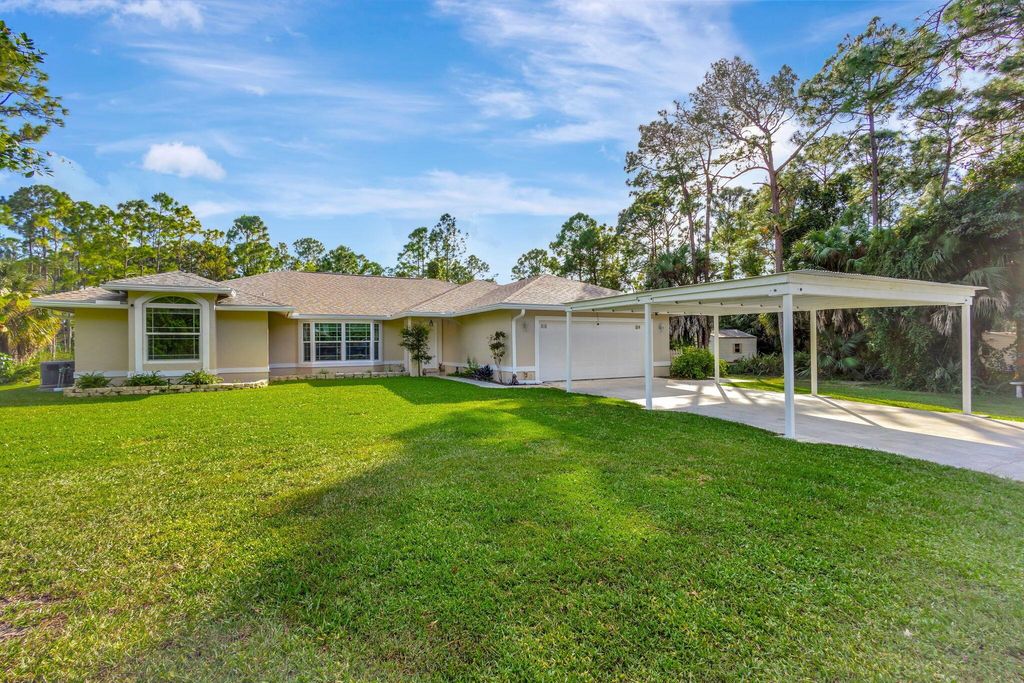 Photo of 15550 73rd Street N, The Acreage, FL 33470 (MLS # R11090138)