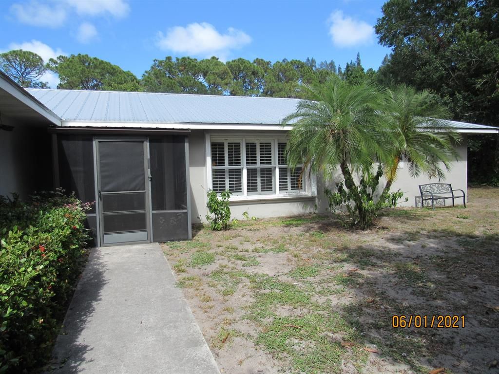 Photo of 2441 SE Delano Road, Port Saint Lucie, FL 34952 (MLS # R10720670)