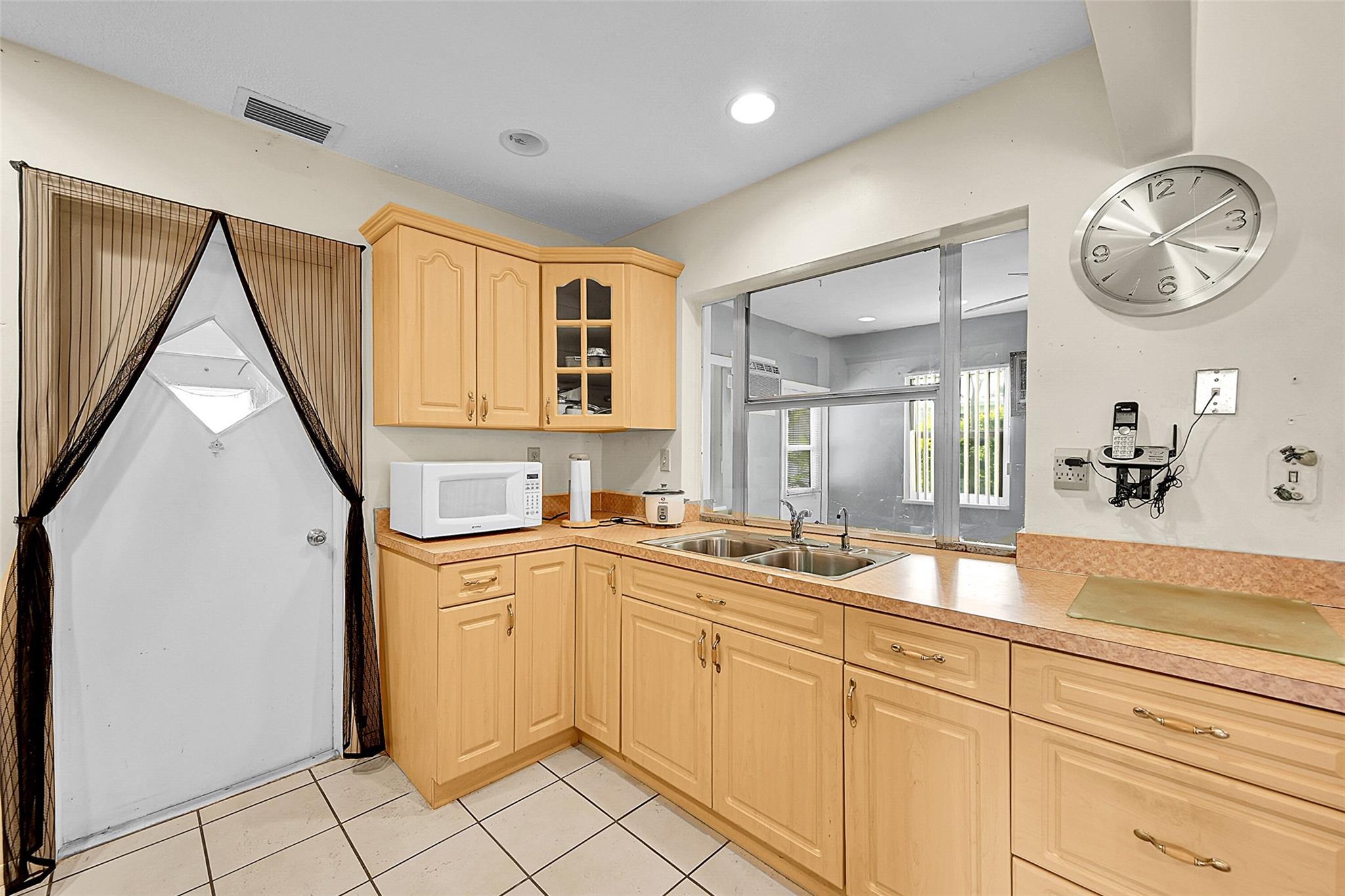 8309 NW 59th St