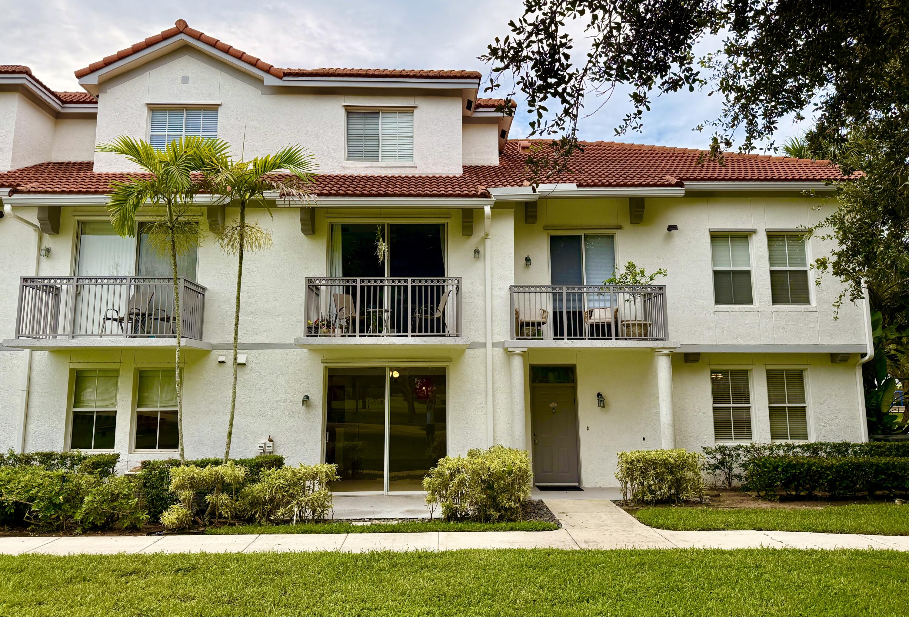 ONLY A FEW MINUTES DRIVE FROM THE BEACH! This RARELY AVAILABLE 1st Floor, 2 BR, 2 BA CORNER residence is centrally located within TERRA VERDE and in a PRIME EAST DELRAY location. The unit offers beautiful direct unobstructed LAKE and GARDENS views. OPEN FLOOR PLAN. Large walk-in closets. One-car garage. Storm Shutters. TILE flooring throughout. STAINLESS STEEL appliances. GRANITE counters in kitchen. Minutes from historic Downtown, I-95, Tri-Rail station, Whole Foods Market, Target store, Fresh Market, Trader Joe's, Walmart and more, Tierra Verde is a RESORT-STYLE PRIVATE GATED COMMUNITY with extensive high-end amenities: heated pool, bike/walk path, fitness center, lighted tennis/ pickleball courts, basketball, volleyball, picnic & grilling areas, gazebos and children playground.