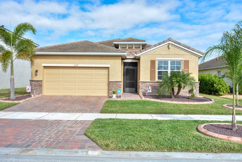 Photo of 12377 SW Arabella Drive, Port Saint Lucie, FL 34987 (MLS # R11050275)