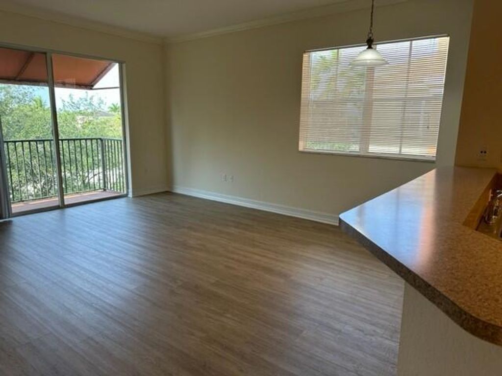 Photo of 4530 Pga Boulevard #302, Palm Beach Gardens, FL 33418 (MLS # R11082774)