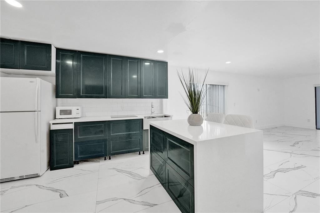 Photo of 300 E Club Cir #110, Boca Raton, FL 33487 (MLS # F10371909)