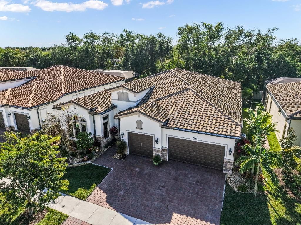 Photo of 7690 Cavern Lane, Parkland, FL 33067 (MLS # R11158164)