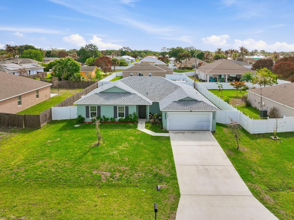 Photo of 1967 SW Beard Street, Port Saint Lucie, FL 34953 (MLS # B26010516)