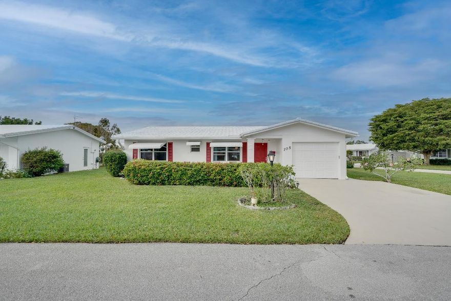 Single Level CBS popular Regis model, 2Br/2Ba on oversized corner lot. Ideally located close to one Clubhouse. New 50 Year Metal Roof, Newer AC 2020 & HWH 2021, Large enclosed glass porch with tile floors. Kitchen has Granite counters, White Kitchen Cabinetry, SS side by side Refrigerator, SS Electric Stove, Luxury Laminate Wood plank floors, Hurricane code garage door. Hurricane protection. The low HOA fee covers lawn maintenance, irrigation, exterior painting, and the amenities at all 3 clubhouses. Residents enjoy the fitness center, 3 pools, jacuzzi, and many activities. Community has a 18 hole Par 3 golf course as well. Close distance to the beach, I-95, Florida Turnpike, Shopping, Dining and Entertainment