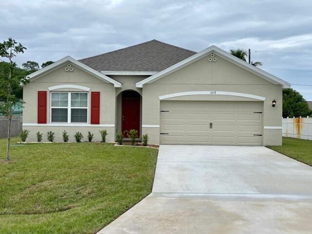 Photo of 1537 SW Meridian Avenue, Port Saint Lucie, FL 34953 (MLS # R10760199)