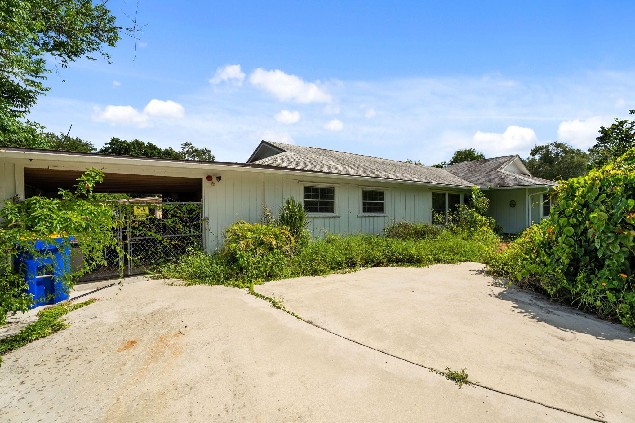 Spacious 3BR, 2BA home with 2,244 sq ft on Fuge Road in Stuart, FL. A great renovation opportunity with solid bones, and an oversized lot. Just minutes from beaches, downtown, and top amenities--endless potential in a prime location!